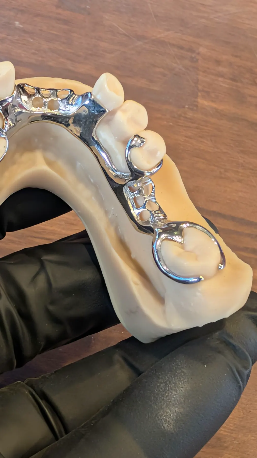 Close view of a polished lower framework clasp